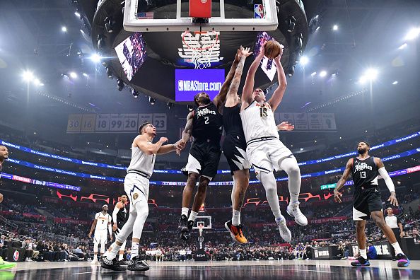 LOS ANGELES, CA - DECEMBER 6: Nikola Jokic #15 of the Denver Nuggets goes to the basket during the game on December 6, 2023 at Crypto.Com Arena in Los Angeles, California. NOTE TO USER: User expressly acknowledges and agrees that, by downloading and/or using this Photograph, user is consenting to the terms and conditions of the Getty Images License Agreement. Mandatory Copyright Notice: Copyright 2023 NBAE (Photo by Adam Pantozzi/NBAE via Getty Images)