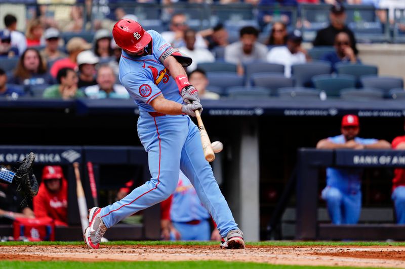 Aug 31, 2024; Bronx, New York, USA; St. Louis Cardinals first baseman Paul Goldschmidt (46) hits a double against the New York Yankees during the third inning at Yankee Stadium. Mandatory Credit: Gregory Fisher-USA TODAY Sports