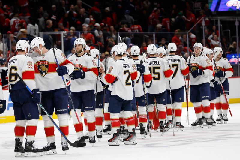 Nov 8, 2023; Washington, District of Columbia, USA; Florida Panthers players celebrate after a game winning goal by Florida Panthers center Sam Reinhart (not pictured) against the Washington Capitals at Capital One Arena. Mandatory Credit: Geoff Burke-USA TODAY Sports