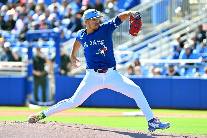 Feb 23, 2026; Dunedin, Florida, USA; Toronto Blue Jays starting  pitcher Jose Berrios (17) throws a pitch in the first inning against the New York Mets at TD Ballpark. Mandatory Credit: Jonathan Dyer-Imagn Images