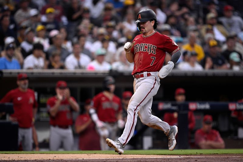 Aug 19, 2023; San Diego, California, USA; Arizona Diamondbacks right fielder Corbin Carroll (7) advances home to score a run against the San Diego Padres during the fifth inning at Petco Park. Mandatory Credit: Orlando Ramirez-USA TODAY Sports