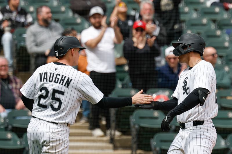 May 1, 2025; Chicago, Illinois, USA; Chicago White Sox third baseman Miguel Vargas (20) celebrates with first baseman Andrew Vaughn (25) after hitting a three-run home run against the Milwaukee Brewers during the sixth inning at Rate Field. Mandatory Credit: Kamil Krzaczynski-Imagn Images