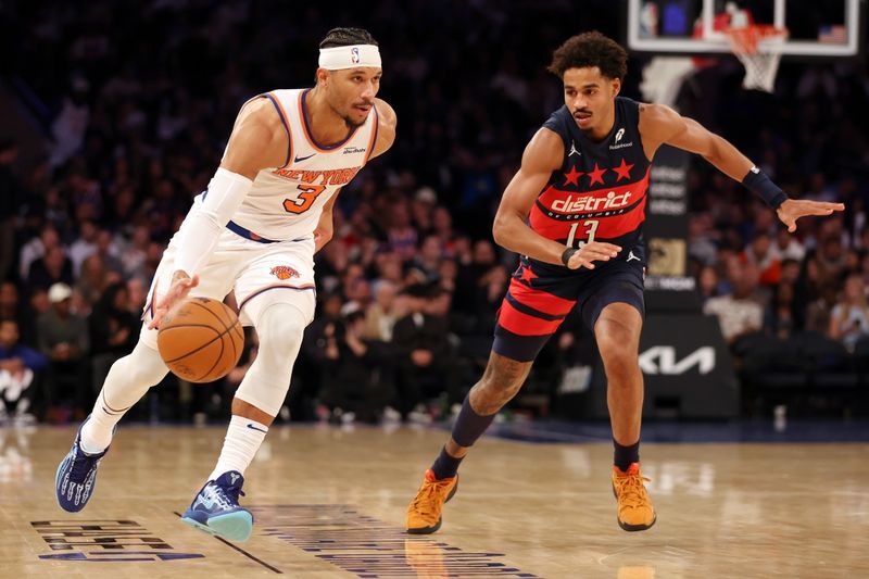 NEW YORK, NEW YORK - NOVEMBER 18: Josh Hart #3 of the New York Knicks dribbles against Jordan Poole #13 of the Washington Wizards during the second half at Madison Square Garden on November 18, 2024 in New York City. NOTE TO USER: User expressly acknowledges and agrees that, by downloading and or using this photograph, User is consenting to the terms and conditions of the Getty Images License Agreement. (Photo by Sarah Stier/Getty Images)