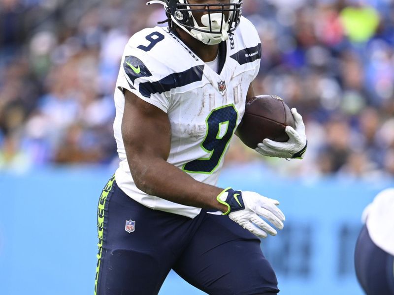 Seattle Seahawks running back Kenneth Walker III (9) plays against the Tennessee Titans during an NFL football game Sunday, Dec. 24, 2023, in Nashville, Tenn. (AP Photo/John Amis)