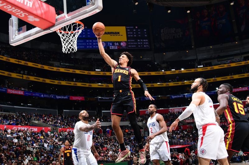 LOS ANGELES, CA - MARCH 17: Jalen Johnson #1 of the Atlanta Hawks drives to the basket during the game against the LA Clippers on March 17, 2024 at Crypto.Com Arena in Los Angeles, California. NOTE TO USER: User expressly acknowledges and agrees that, by downloading and/or using this Photograph, user is consenting to the terms and conditions of the Getty Images License Agreement. Mandatory Copyright Notice: Copyright 2024 NBAE (Photo by Adam Pantozzi/NBAE via Getty Images)