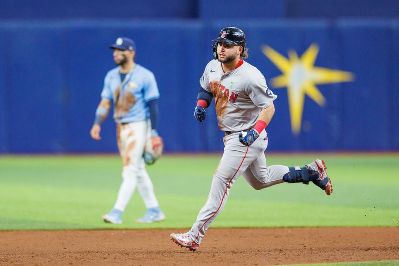 May 22, 2024; St. Petersburg, Florida, USA;  Boston Red Sox outfielder Wilyer Abreu (52) runs the bases after hitting a two run home run against the Tampa Bay Rays in the sixth inning at Tropicana Field. Mandatory Credit: Nathan Ray Seebeck-USA TODAY Sports