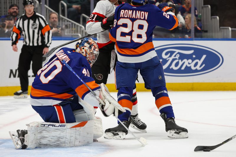 Mar 16, 2024; Elmont, New York, USA;  New York Islanders goaltender Semyon Varlamov (40) tracks the puck against the Ottawa Senators during the first period at UBS Arena. Mandatory Credit: Thomas Salus-USA TODAY Sports