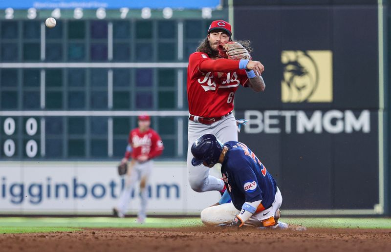 Jun 18, 2023; Houston, Texas, USA; Houston Astros shortstop Jeremy Pena (3) is out at second base as Cincinnati Reds second baseman Jonathan India (6) throws to first base to complete a double play during the ninth inning at Minute Maid Park. Mandatory Credit: Troy Taormina-USA TODAY Sports