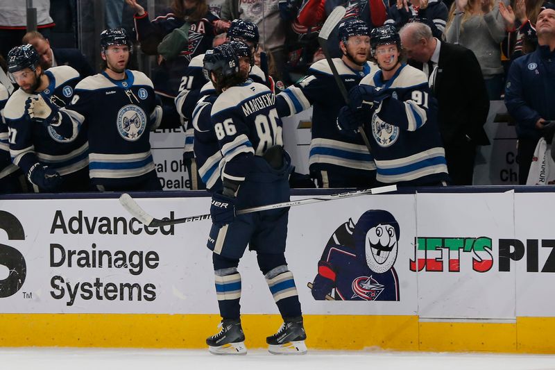 Dec 31, 2024; Columbus, Ohio, USA; Columbus Blue Jackets right wing Kirill Marchenko (86) celebrates his goal against the Carolina Hurricanes during the first period at Nationwide Arena. Mandatory Credit: Russell LaBounty-Imagn Images