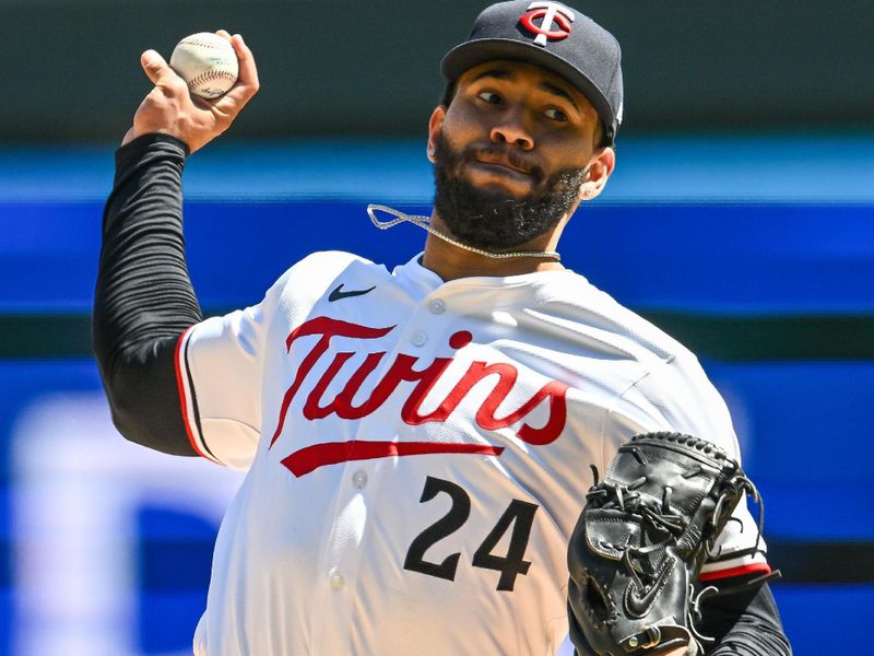 Apr 26, 2025; Minneapolis, Minnesota, USA; Minnesota Twins pitcher Simeon Woods Richardson (24) throws a pitch against the Los Angeles Angels during the second inning at Target Field. Mandatory Credit: Jeffrey Becker-Imagn Images