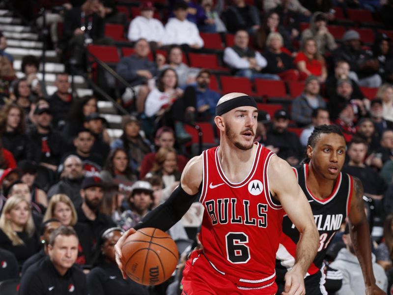 PORTLAND, OR - JANUARY 28: Alex Caruso #6 of the Chicago Bulls handles the ball during the game against the Portland Trail Blazers on January 28, 2024 at the Moda Center Arena in Portland, Oregon. NOTE TO USER: User expressly acknowledges and agrees that, by downloading and or using this photograph, user is consenting to the terms and conditions of the Getty Images License Agreement. Mandatory Copyright Notice: Copyright 2024 NBAE (Photo by Cameron Browne/NBAE via Getty Images)