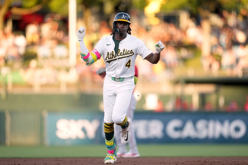 May 21, 2025; West Sacramento, California, USA; Athletics right fielder Lawrence Butler (4) reacts after hitting a three-run home run against the Los Angeles Angels in the second inning at Sutter Health Park. Mandatory Credit: Cary Edmondson-Imagn Images