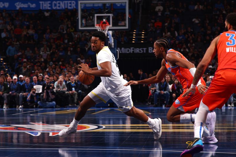 OKLAHOMA CITY, OK - DECEMBER 3: Brice Sensabaugh #28 of the Utah Jazz drives to the basket during the game against the Oklahoma City Thunder during the Emirates NBA Cup game on on December 3, 2024 at Paycom Center in Oklahoma City, Oklahoma. NOTE TO USER: User expressly acknowledges and agrees that, by downloading and or using this photograph, User is consenting to the terms and conditions of the Getty Images License Agreement. Mandatory Copyright Notice: Copyright 2024 NBAE (Photo by Zach Beeker/NBAE via Getty Images)