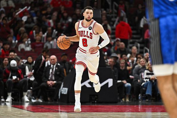 CHICAGO, ILLINOIS - NOVEMBER 15:  Zach Lavine #8 of the Chicago Bulls controls the ball against the Orlando Magic on November 15, 2023 at United Center in Chicago, Illinois.   NOTE TO USER: User expressly acknowledges and agrees that, by downloading and or using this photograph, User is consenting to the terms and conditions of the Getty Images License Agreement.  (Photo by Jamie Sabau/Getty Images)