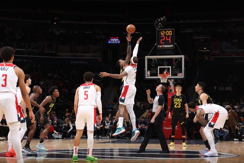 WASHINGTON, DC -? JANUARY 25: John Collins #20 of the Utah Jazz and Daniel Gafford #21 of the Washington Wizards go up for the opening tip off on January 25, 2024 at Capital One Arena in Washington, DC. NOTE TO USER: User expressly acknowledges and agrees that, by downloading and or using this Photograph, user is consenting to the terms and conditions of the Getty Images License Agreement. Mandatory Copyright Notice: Copyright 2024 NBAE (Photo by Stephen Gosling/NBAE via Getty Images)