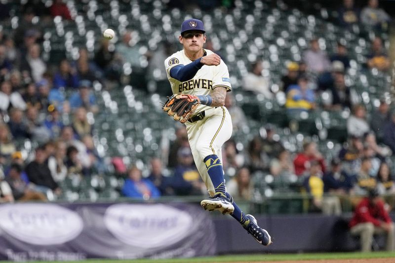 May 9, 2024; Milwaukee, Wisconsin, USA;  Milwaukee Brewers third baseman Joey Ortiz (3) throws out St. Louis Cardinals designated hitter Brendan Donovan (33) (not pictured) during the seventh inning at American Family Field. Mandatory Credit: Jeff Hanisch-USA TODAY Sports