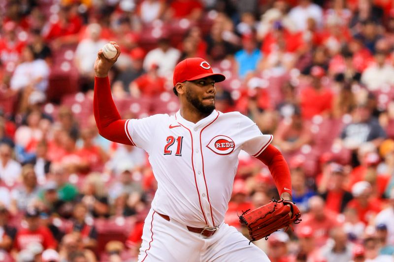 Sep 22, 2024; Cincinnati, Ohio, USA; Cincinnati Reds starting pitcher Hunter Greene (21) pitches against the Pittsburgh Pirates in the first inning at Great American Ball Park. Mandatory Credit: Katie Stratman-Imagn Images