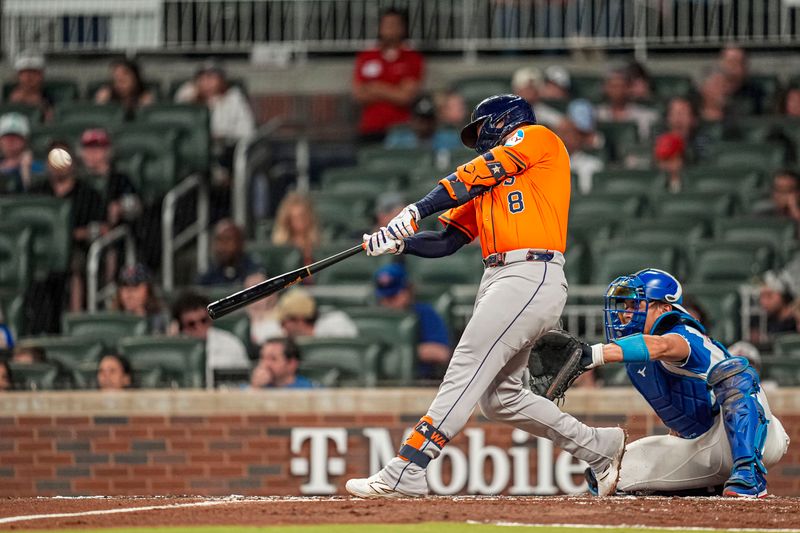 Sep 13, 2025; Cumberland, Georgia, USA; Houston Astros first baseman Christian Walker (8) hits a two run home run against the Atlanta Braves during the third inning at Truist Park. Mandatory Credit: Dale Zanine-Imagn Images