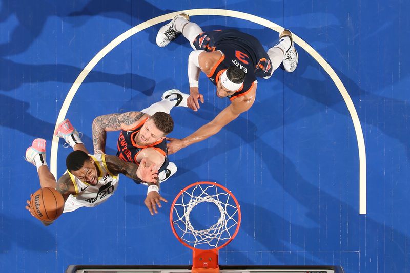 NEW YORK, NY - JANUARY 30: John Collins #20 of the Utah Jazz drives to the basket during the game against the New York Knicks on January 30, 2024 at Madison Square Garden in New York City, New York.  NOTE TO USER: User expressly acknowledges and agrees that, by downloading and or using this photograph, User is consenting to the terms and conditions of the Getty Images License Agreement. Mandatory Copyright Notice: Copyright 2024 NBAE  (Photo by Nathaniel S. Butler/NBAE via Getty Images)