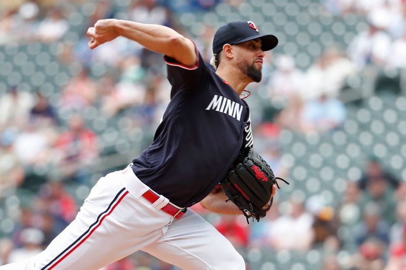 May 11, 2023; Minneapolis, Minnesota, USA; Minnesota Twins relief pitcher Jorge Lopez (48) throws to the San Diego Padres in the ninth inning at Target Field. Mandatory Credit: Bruce Kluckhohn-USA TODAY Sports