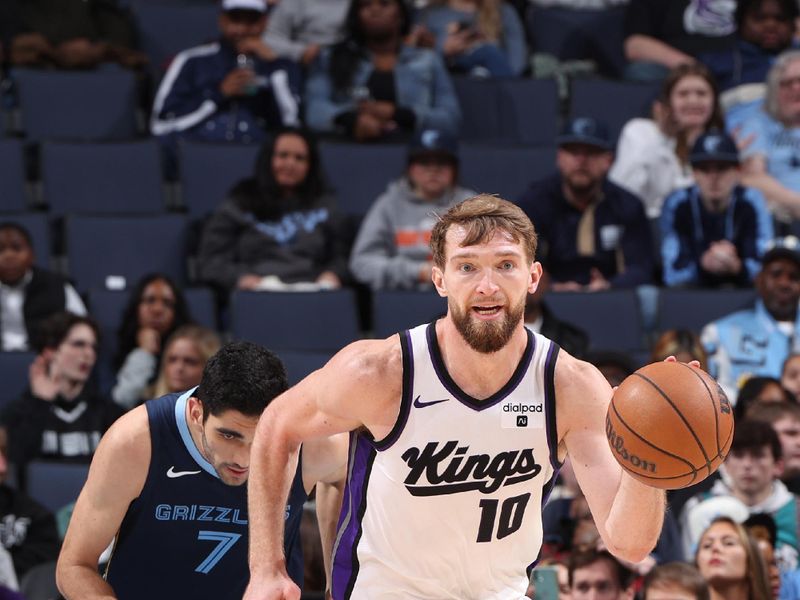 MEMPHIS, TN - JANUARY 29:  Domantas Sabonis #10 of the Sacramento Kings handles the ball during the game against the Memphis Grizzlies on January 29, 2024 at FedExForum in Memphis, Tennessee. NOTE TO USER: User expressly acknowledges and agrees that, by downloading and or using this photograph, User is consenting to the terms and conditions of the Getty Images License Agreement. Mandatory Copyright Notice: Copyright 2024 NBAE (Photo by Joe Murphy/NBAE via Getty Images)