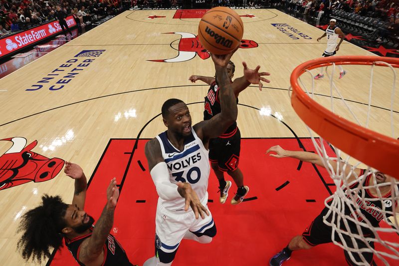 CHICAGO, ILLINOIS - NOVEMBER 07: Julius Randle #30 of the Minnesota Timberwolves shoots against the Chicago Bulls at the United Center on November 07, 2024 in Chicago, Illinois. NOTE TO USER: User expressly acknowledges and agrees that, by downloading and or using this photograph, User is consenting to the terms and conditions of the Getty Images License Agreement.  (Photo by Michael Reaves/Getty Images)