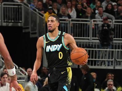 INDIANAPOLIS, IN - DECEMBER 23:  Tyrese Haliburton #0 of the Indiana Pacers handles the ball during the game against the Orlando Magic on December 23, 2023 at Gainbridge Fieldhouse in Indianapolis, Indiana. NOTE TO USER: User expressly acknowledges and agrees that, by downloading and or using this Photograph, user is consenting to the terms and conditions of the Getty Images License Agreement. Mandatory Copyright Notice: Copyright 2023 NBAE (Photo by Pepper Robinson/NBAE via Getty Images)