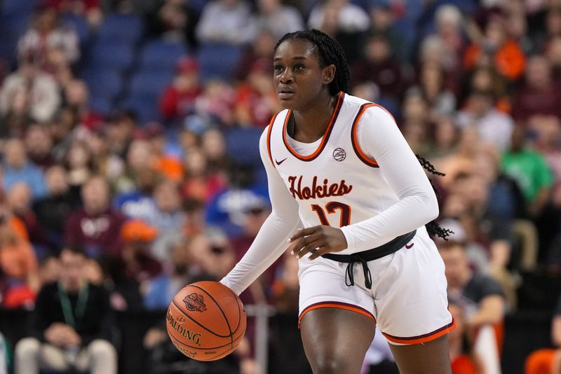 Mar 9, 2024; Greensboro, NC, USA; Virginia Tech Hokies guard Samyha Suffren (12) brings the ball up court in the first half against the Notre Dame Fighting Irish at Greensboro Coliseum. Mandatory Credit: David Yeazell-USA TODAY Sports