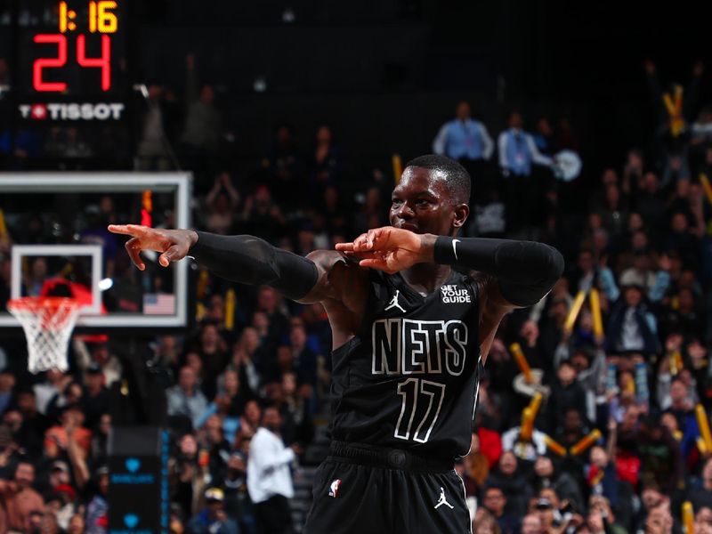 BROOKLYN, NY - OCTOBER 29: Dennis Schroder #17 of the Brooklyn Nets celebrates during the game against the Denver Nuggets on October 29, 2024 at Barclays Center in Brooklyn, New York. NOTE TO USER: User expressly acknowledges and agrees that, by downloading and or using this Photograph, user is consenting to the terms and conditions of the Getty Images License Agreement. Mandatory Copyright Notice: Copyright 2024 NBAE (Photo by David L. Nemec/NBAE via Getty Images)