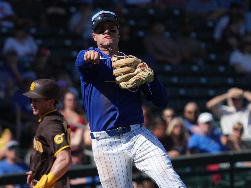 Feb 24, 2026; Mesa, Arizona, USA; Chicago Cubs third baseman Matt Shaw (6) makes the off balance throw for an out against the San Diego Padres in the third inning at Sloan Park. Mandatory Credit: Rick Scuteri-Imagn Images