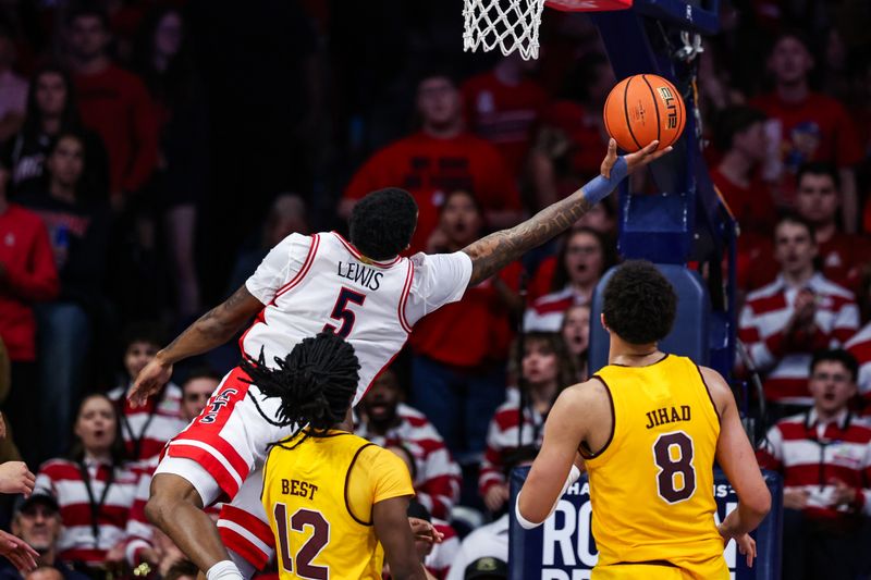 Mar 4, 2025; Tucson, Arizona, USA; Arizona Wildcats guard KJ Lewis (5) makes a layup during the first half against the Arizona State Sun Devils at McKale Center. Mandatory Credit: Aryanna Frank-Imagn Images