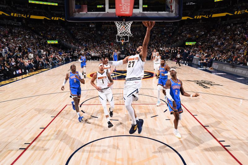 DENVER, CO - OCTOBER 24: Jamal Murray #27 of the Denver Nuggets drives to the basket during the game against the Oklahoma City Thunder on October 24, 2024 at Ball Arena in Denver, Colorado. NOTE TO USER: User expressly acknowledges and agrees that, by downloading and/or using this Photograph, user is consenting to the terms and conditions of the Getty Images License Agreement. Mandatory Copyright Notice: Copyright 2024 NBAE (Photo by Garrett Ellwood/NBAE via Getty Images)