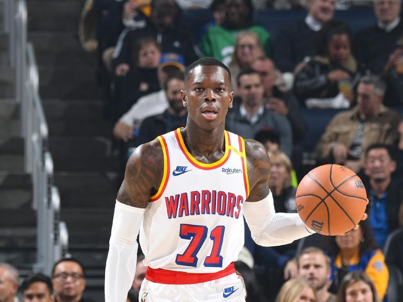 SAN FRANCISCO, CA - JANUARY 2: Dennis Schroder #71 of the Golden State Warriors dribbles the ball during the game against the Philadelphia 76ers  on January 2, 2025 at Chase Center in San Francisco, California. NOTE TO USER: User expressly acknowledges and agrees that, by downloading and or using this photograph, user is consenting to the terms and conditions of Getty Images License Agreement. Mandatory Copyright Notice: Copyright 2025 NBAE (Photo by Noah Graham/NBAE via Getty Images)