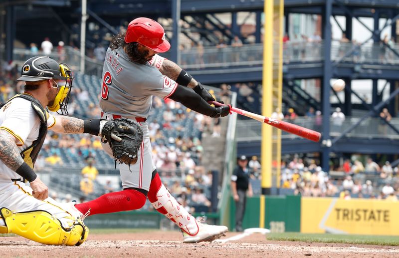 Jun 19, 2024; Pittsburgh, Pennsylvania, USA;  Cincinnati Reds second baseman Jonathan India (6) hits a single against the Pittsburgh Pirates during the sixth inning at PNC Park. The Pirates shutout the Reds 1-0. Mandatory Credit: Charles LeClaire-USA TODAY Sports