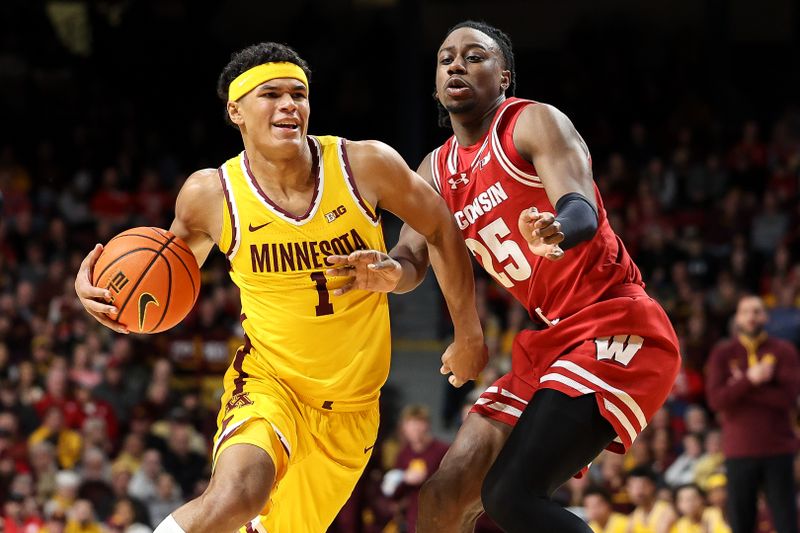 Mar 5, 2025; Minneapolis, Minnesota, USA; Minnesota Golden Gophers guard Isaac Asuma (1) works around Wisconsin Badgers guard John Blackwell (25) during the first half at Williams Arena. Mandatory Credit: Matt Krohn-Imagn Images