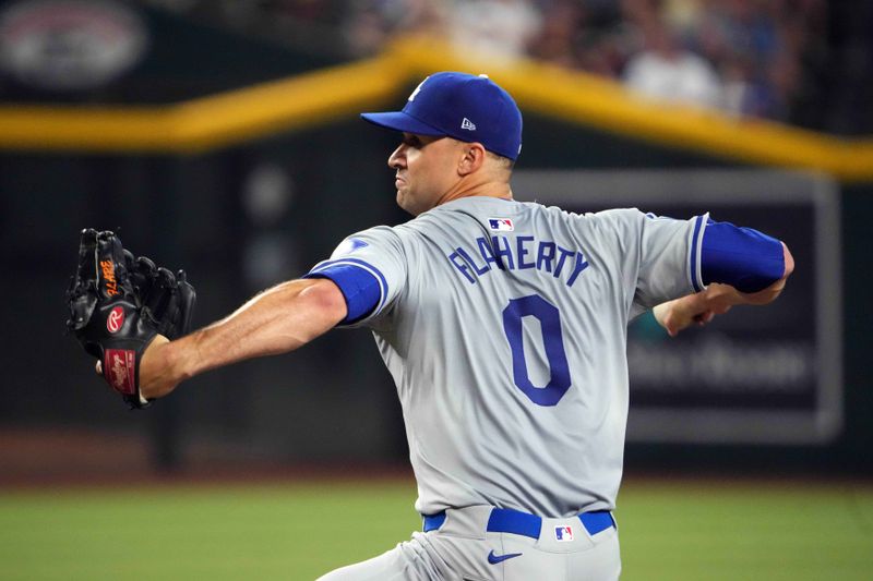Sep 2, 2024; Phoenix, Arizona, USA; Los Angeles Dodgers pitcher Jack Flaherty (0) pitches during the first inning at Chase Field. Mandatory Credit: Joe Camporeale-USA TODAY Sports