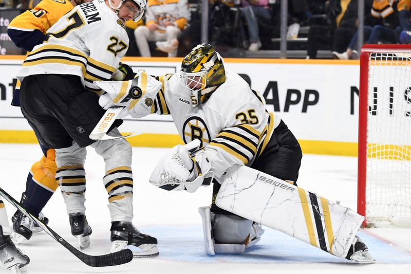 Apr 2, 2024; Nashville, Tennessee, USA; Boston Bruins goaltender Linus Ullmark (35) makes a save during the third period against the Nashville Predators at Bridgestone Arena. Mandatory Credit: Christopher Hanewinckel-USA TODAY Sports