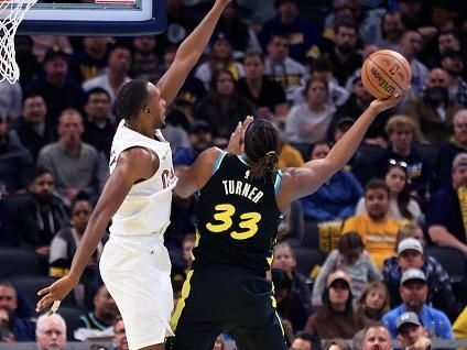 INDIANAPOLIS, INDIANA - NOVEMBER 03: Myles Turner #33 of the Indiana Pacers takes a shot over Evan Mobley #4 of the Cleveland Cavaliers during the first half of the NBA In-Season Tournament game at Gainbridge Fieldhouse on November 03, 2023 in Indianapolis, Indiana. NOTE TO USER: User expressly acknowledges and agrees that, by downloading and or using this photograph, User is consenting to the terms and conditions of the Getty Images License Agreement.  (Photo by Justin Casterline/Getty Images)