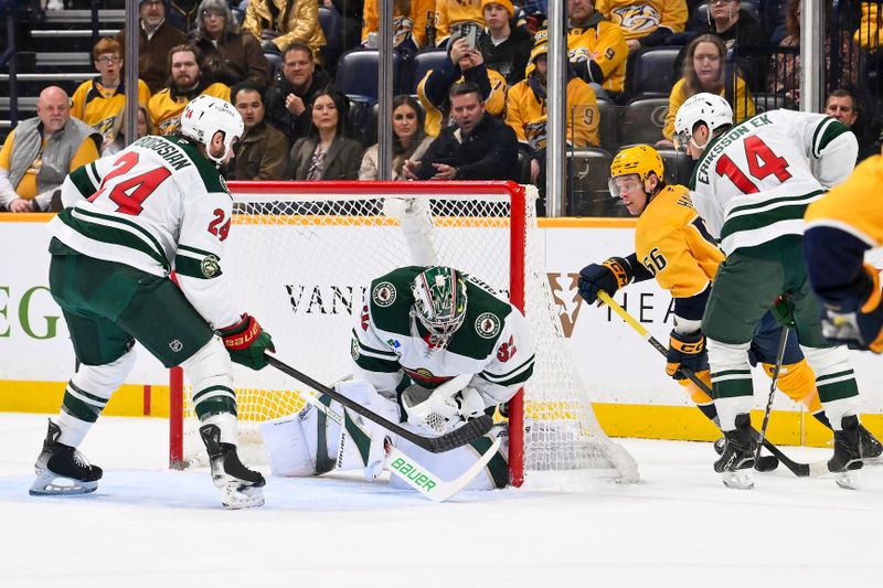 Feb 4, 2026; Nashville, Tennessee, USA;  Nashville Predators left wing Erik Haula (56) scores past Minnesota Wild goaltender Filip Gustavsson (32) during the first period at Bridgestone Arena. Mandatory Credit: Steve Roberts-Imagn Images