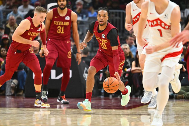 CLEVELAND, OHIO - JANUARY 09: Darius Garland #10 of the Cleveland Cavaliers brings the ball up court during the second quarter against the Toronto Raptors at Rocket Mortgage Fieldhouse on January 09, 2025 in Cleveland, Ohio. NOTE TO USER: User expressly acknowledges and agrees that, by downloading and or using this photograph, User is consenting to the terms and conditions of the Getty Images License Agreement. (Photo by Jason Miller/Getty Images)