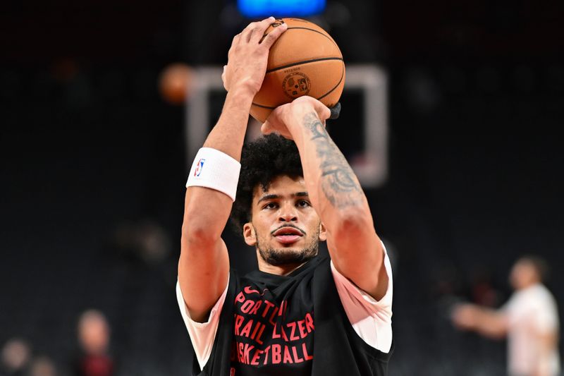 PORTLAND, OREGON - OCTOBER 18: Toumani Camara #33 of the Portland Trail Blazers warms up before the game against the Utah Jazz at Moda Center on October 18, 2024 in Portland, Oregon. NOTE TO USER: User expressly acknowledges and agrees that, by downloading and or using this photograph, User is consenting to the terms and conditions of the Getty Images License Agreement. (Photo by Alika Jenner/Getty Images)