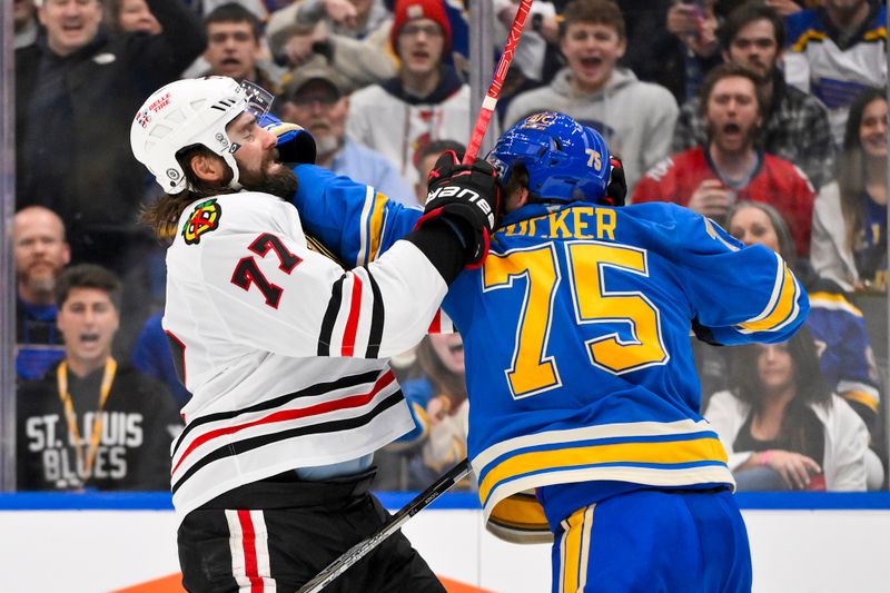 Mar 22, 2025; St. Louis, Missouri, USA;  Chicago Blackhawks left wing Patrick Maroon (77) fights St. Louis Blues defenseman Tyler Tucker (75) during the third period at Enterprise Center. Mandatory Credit: Jeff Curry-Imagn Images