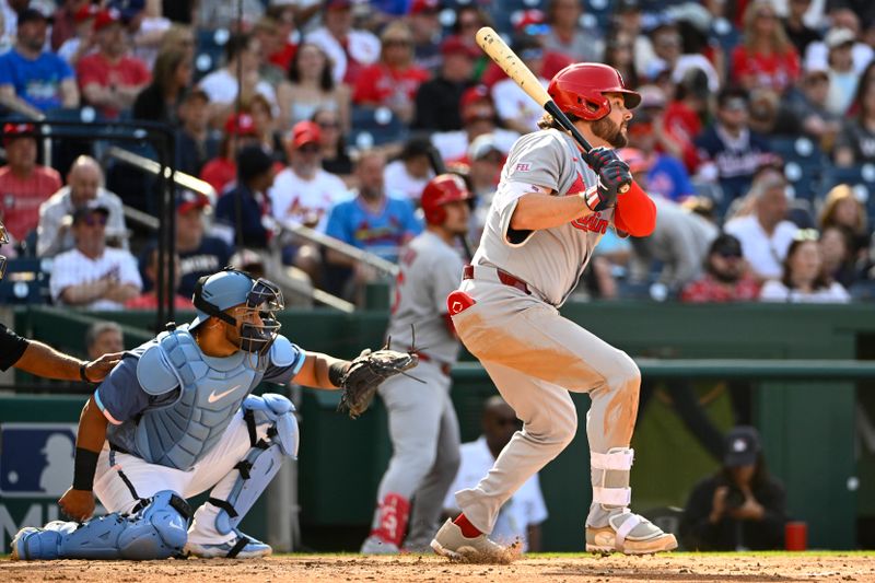 May 10, 2025; Washington, District of Columbia, USA; St. Louis Cardinals designated hitter Alec Burleson (41) singles against the Washington Nationals during the fourth inning at Nationals Park. Mandatory Credit: Brad Mills-Imagn Images