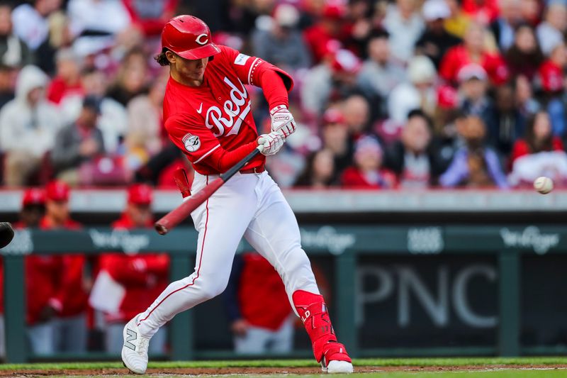 Apr 20, 2024; Cincinnati, Ohio, USA; Cincinnati Reds outfielder Stuart Fairchild (17) hits a RBI double against the Los Angeles Angels in the first inning at Great American Ball Park. Mandatory Credit: Katie Stratman-USA TODAY Sports