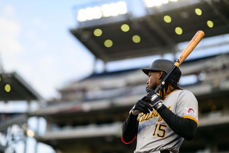 Apr 4, 2024; Washington, District of Columbia, USA; Pittsburgh Pirates shortstop Oneil Cruz (15) warms up in the batters circle during the eighth inning against the Washington Nationals at Nationals Park. Mandatory Credit: Reggie Hildred-USA TODAY Sports