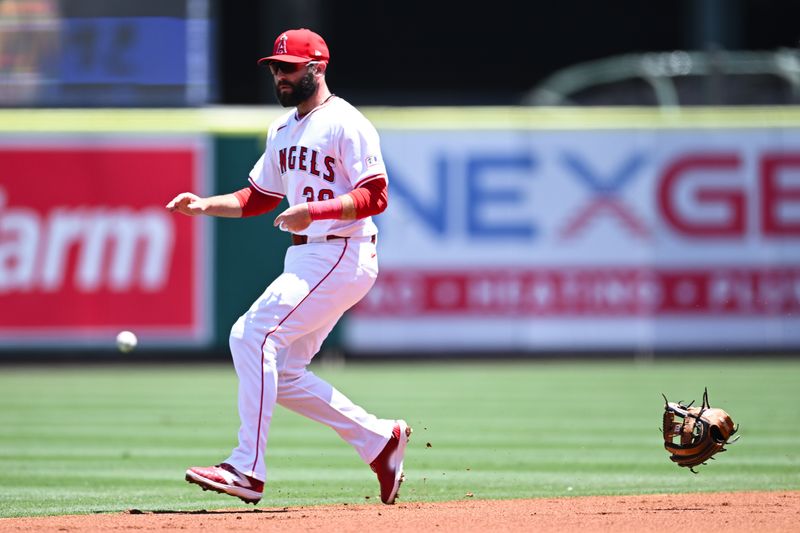Aug 4, 2024; Anaheim, California, USA; Los Angeles Angels second baseman Michael Stefanic (38) misses a catch against the New York Mets during the first inning at Angel Stadium. Mandatory Credit: Jonathan Hui-USA TODAY Sports