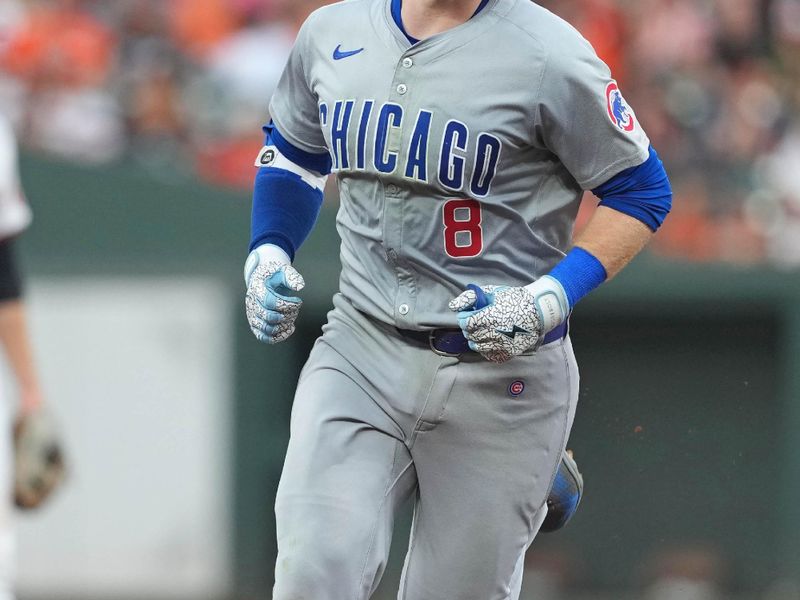 Jul 9, 2024; Baltimore, Maryland, USA; Chicago Cubs outfielder Ian Happ (8) rounds the bases following his three run home run in the fourth inning against the Baltimore Orioles at Oriole Park at Camden Yards. Mandatory Credit: Mitch Stringer-USA TODAY Sports