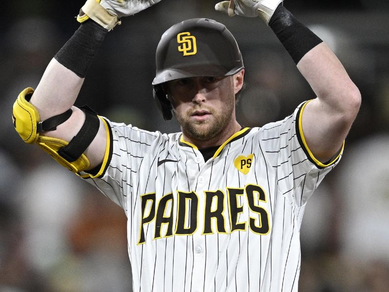 Jun 10, 2024; San Diego, California, USA; San Diego Padres second baseman Jake Cronenworth (9) celebrates after hitting a double against the Oakland Athletics during the fifth inning at Petco Park. Mandatory Credit: Orlando Ramirez-USA TODAY Sports