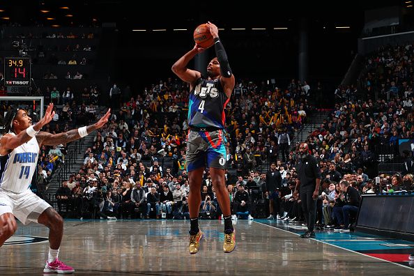 BROOKLYN, NY - DECEMBER 2: Dennis Smith Jr. #4 of the Brooklyn Nets shoots the ball during the game against the Orlando Magic on December 2, 2023 at Barclays Center in Brooklyn, New York. NOTE TO USER: User expressly acknowledges and agrees that, by downloading and or using this Photograph, user is consenting to the terms and conditions of the Getty Images License Agreement. Mandatory Copyright Notice: Copyright 2023 NBAE (Photo by David L. Nemec/NBAE via Getty Images)