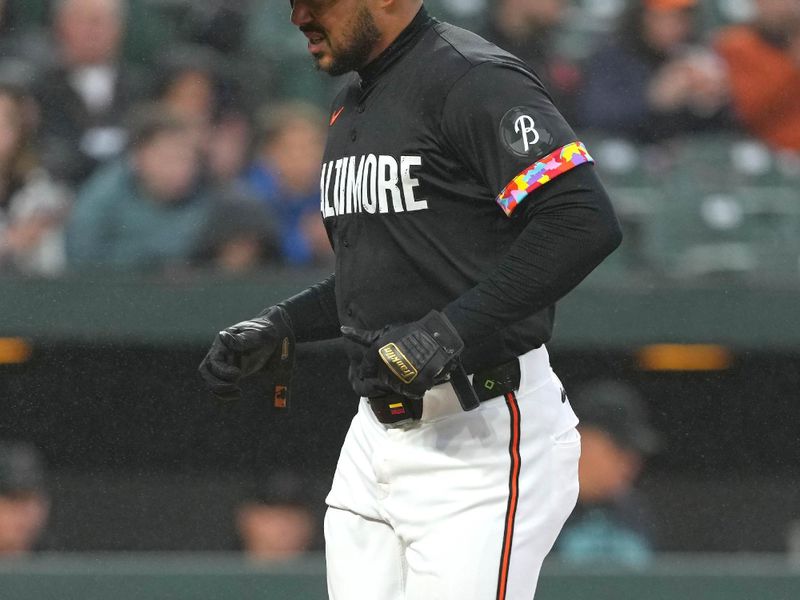 May 10, 2024; Baltimore, Maryland, USA; Baltimore Orioles outfielder Anthony Santander (25) after a groundout by Cedric Mullins (not shown) in the second inning against the Arizona Diamondbacks at Oriole Park at Camden Yards. Mandatory Credit: Mitch Stringer-USA TODAY Sports